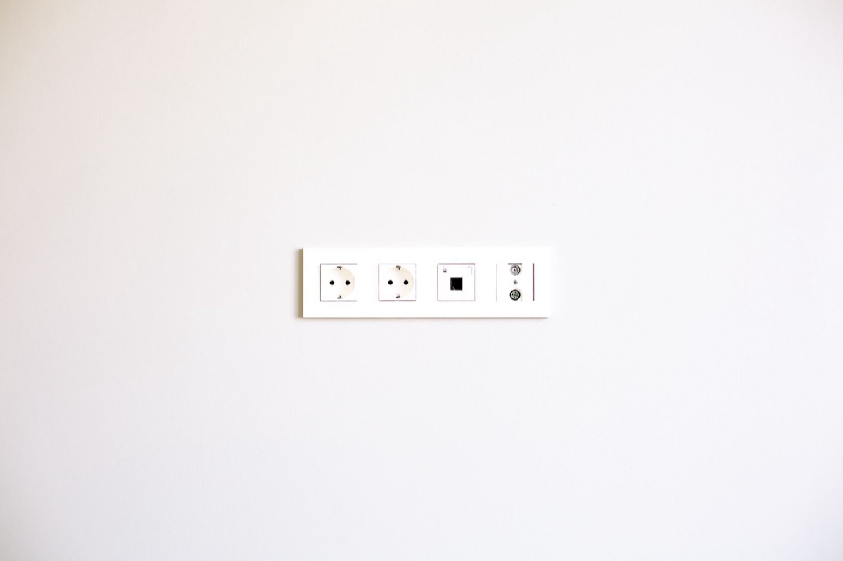 A standard household power strip with multiple plugs connected