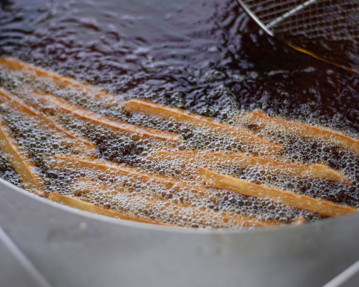 Close up of grease buildup inside a kitchen drain