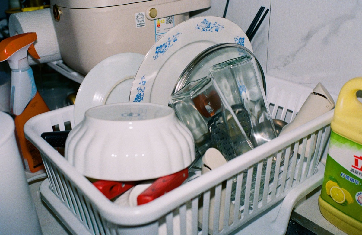 Baking soda and white vinegar being used for cleaning