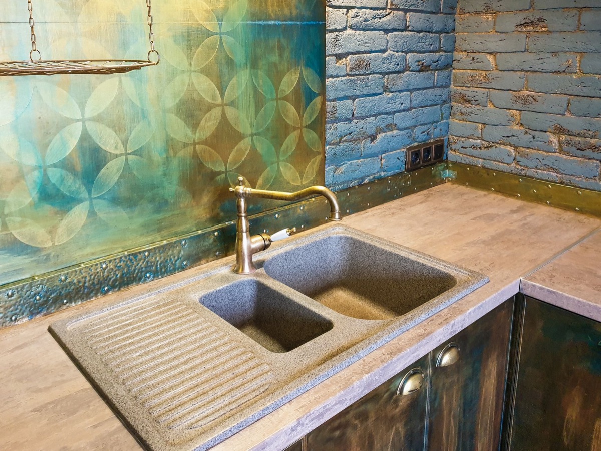 A rubber sink plunger placed on a kitchen counter